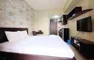 Lobi 2 Minimalist Studio Room at Serpong Greenview by Travelio