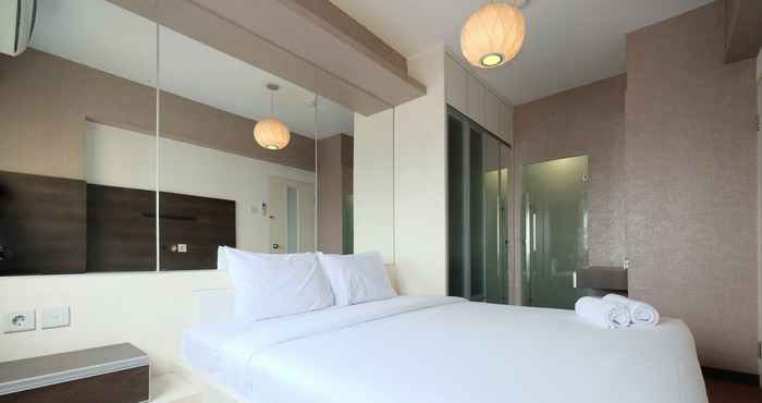 Bedroom Modern 2BR Mutiara Bekasi Apartment by Travelio