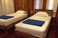 Kamar Tidur Tamarind Home Stay & Camp