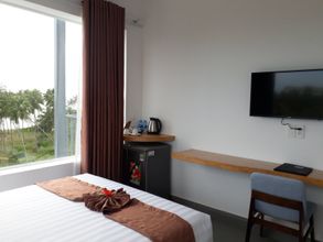 卧室 4 Damina Boutique Hotel