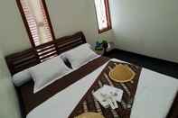 ห้องนอน Comfy Room at Walasa Homestay 1 Syariah