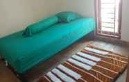 Kamar Tidur 5 Cozy Room Syariah at Permata Garden Guesthouse