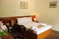 Phòng ngủ Casa Belina Tourist Inn