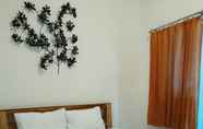 ห้องนอน 4 Cozy Residence Wedasari Bali