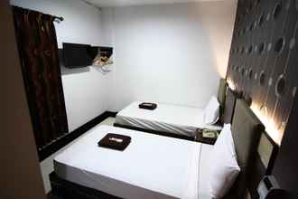 Kamar Tidur 4 Happy Hotel Batam