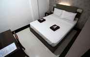 Bedroom 6 Happy Hotel Batam