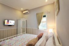 Bedroom Omah Madam Bed and Breakfast