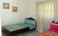 Kamar Tidur 3 Traditional Filipino Cottages