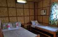 Kamar Tidur 7 Traditional Filipino Cottages