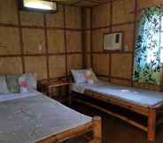 Kamar Tidur 7 Traditional Filipino Cottages