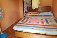 Kamar Tidur Trisha's Lodging House