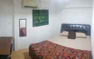 Phòng ngủ 4 T-Rooms Homestay Palembang@Bandara