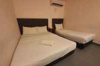 Bilik Tidur SPOT ON 89698 Budget Inn Hotel