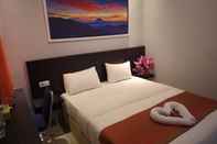 Kamar Tidur The Maximus Hotel