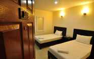 Kamar Tidur 6 The Village Hotel