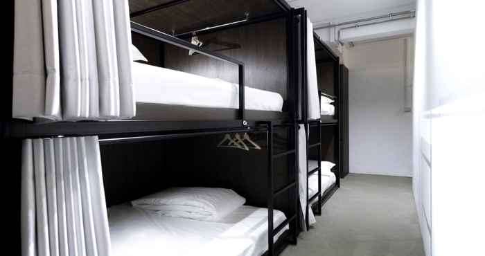 ห้องนอน Bond Boutique Capsule Hotel