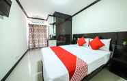 Phòng ngủ 6 OYO 118 Beach Walk Stay