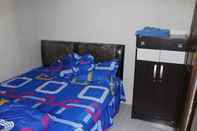 Bedroom Cozy Homestay Bukit Indah by Damandiri Selo