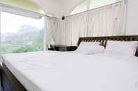 Kamar Tidur Villa Pinus by The Amazing Malang