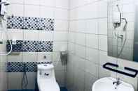 Toilet Kamar Lunas - Inn ( Shared Common Area ) 