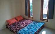 Kamar Tidur 6 3 Bedroom at Homestay Bandara