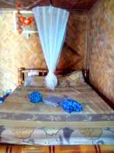 Kamar Tidur 4 Arkadia Beach Resort Underground River