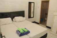 Bilik Tidur Ethnic Room at Griya Jetis