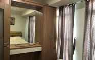 Bedroom 6 Apartemen Puri Orchard by ANG