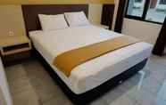 Kamar Tidur 6 Hotel 99 Jember