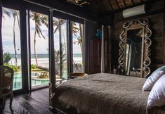 臥室 3 Romantic Beachfront Villa Laut