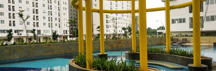 Lobby Comfy 2BR Bassura City Apartment near Mall by Travelio