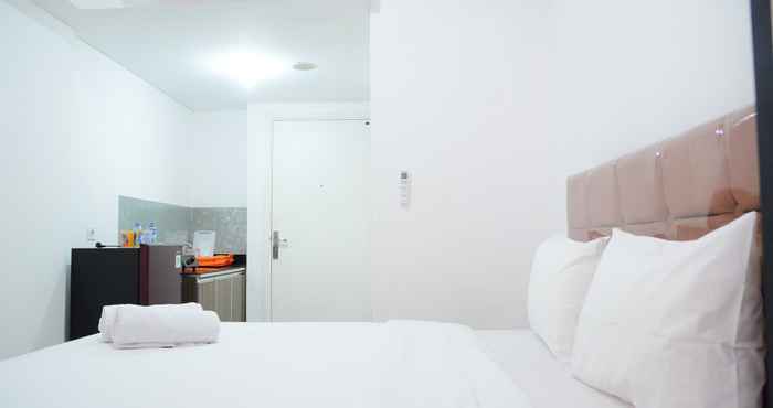 Bedroom Comfy Studio Poris 88 Apartment by Travelio