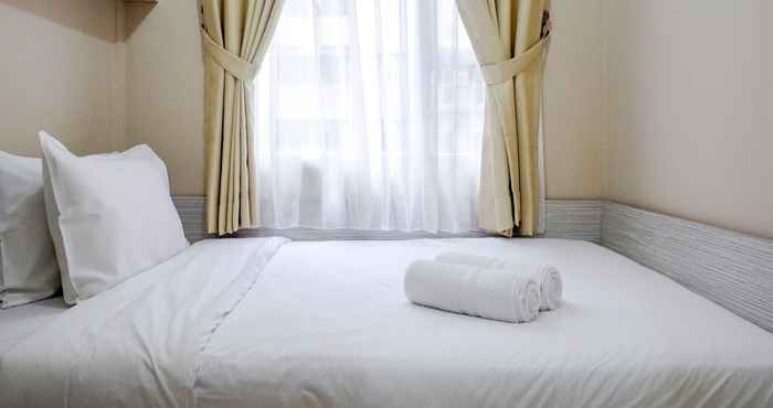 Bedroom Strategic 1BR Menteng Square Apartment at Central Area by Travelio