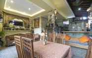 Restoran 3 OYO 401 The Frog Homestay Sanur