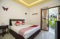 Bedroom OYO 401 The Frog Homestay Sanur