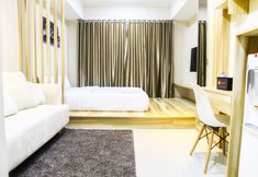 ห้องนอน 7 Modern Style The Oasis Studio Apartment with Comfortable Sofa by Travelio
