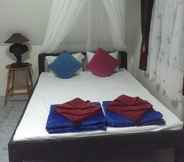 Kamar Tidur 5 Amynta Resort