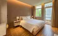 Kamar Tidur 2 Relax Hotel by Ixorat