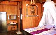 Kamar Tidur 4 Mayalibit Bay Cottage