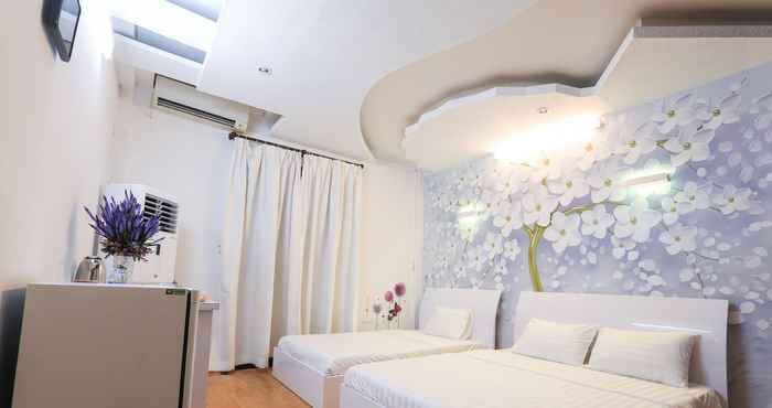 Phòng ngủ Kim Spa Apartment