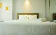 Bedroom 5 Mahogany Suites Studio Room The Oasis Apartment Cikarang by Travelio