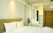 Phòng ngủ 4 Mahogany Suites Studio Room The Oasis Apartment Cikarang by Travelio