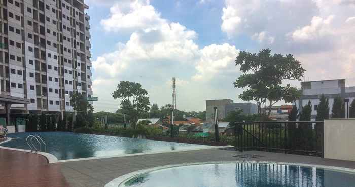 Bangunan Strategic Studio Apartment The Oasis near Bekasi by Travelio