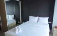 Kamar Tidur 6 Strategic Studio Apartment The Oasis near Bekasi by Travelio