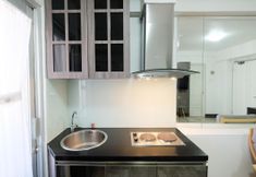 Bedroom 5 Spacious 1BR Apartment at Green Bay Pluit by Travelio