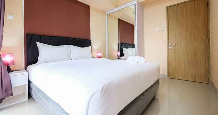 Kamar Tidur Bright and Stylish 1BR The Oasis Apartment Cikarang by Travelio