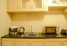 Bedroom 4 Best 3BR Apartment Grand Palace Kemayoran with Sofabed by Travelio