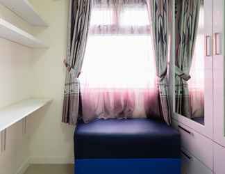 Bedroom 2 Comfort 2BR with Pool View Green Pramuka City Apartment by Travelio