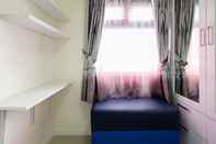 Bedroom Comfort 2BR with Pool View Green Pramuka City Apartment by Travelio