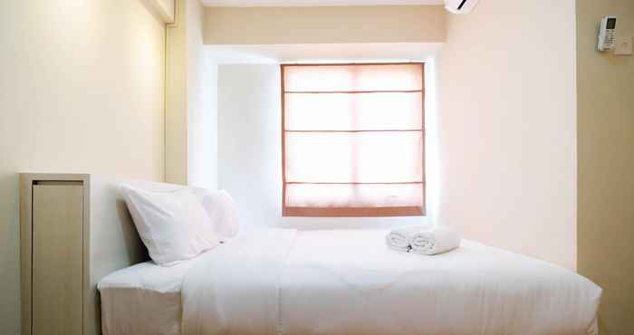 Bedroom Connect to Pool 2BR Apartment at Bassura City by Travelio